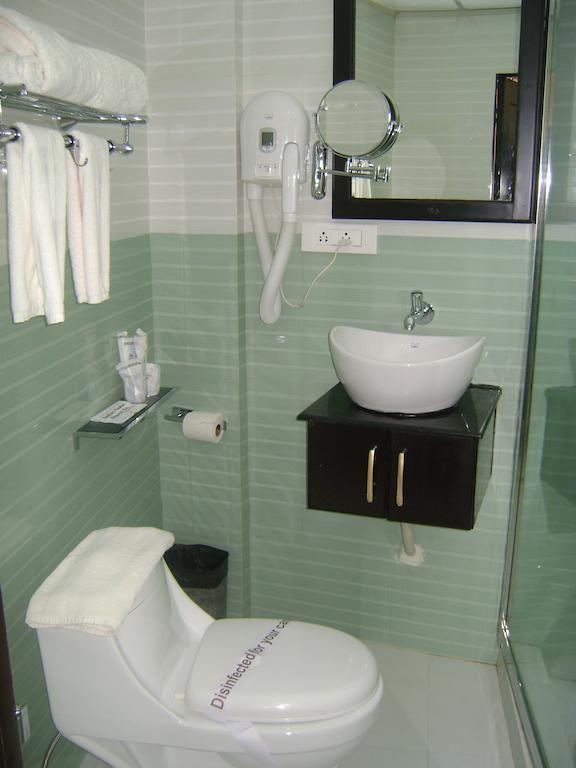 Gago Inn Thiruvananthapuram Habitación foto